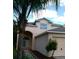 Charming two-story home with a well-maintained front yard and a two car garage at 2011 N 61St St, Tampa, FL 33619