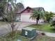 Single story home with a large two car garage and well maintained yard at 2011 N 61St St, Tampa, FL 33619