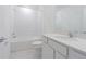 Bathroom with white subway tile in the shower/tub, toilet, and vanity with sink at 9661 Summers Cay Cir, Thonotosassa, FL 33592