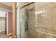 Modern bathroom featuring a shower with multi-spray system and a glass door at 414 Mahogany Dr, Seffner, FL 33584