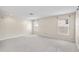 Spacious bedroom with neutral carpet, and two windows providing natural light at 414 Mahogany Dr, Seffner, FL 33584