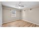 Small bedroom with a ceiling fan and a window for natural light at 414 Mahogany Dr, Seffner, FL 33584