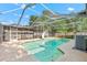 Inviting screened-in pool area perfect for relaxation and entertainment, featuring a slide and ample seating at 414 Mahogany Dr, Seffner, FL 33584