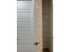 A closet showcasing organized shelving and a pristine white door, optimizing storage space at 20296 Rutherford Ave, Port Charlotte, FL 33952