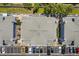 Aerial view shows community layout with parking, landscaping, and residential buildings at 5744 Calais N Blvd # 4, St Petersburg, FL 33714