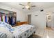 Bedroom features a large closet with rod, and a tiled floor, offering practical living at 5744 Calais N Blvd # 4, St Petersburg, FL 33714