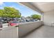 Enclosed patio with a gate, offering privacy and a view of the community parking at 5744 Calais N Blvd # 4, St Petersburg, FL 33714
