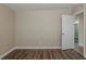 This bedroom has plank flooring and neutral walls at 4010 Emerson S Ave, St Petersburg, FL 33711