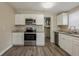 Well-equipped kitchen with modern appliances, granite countertops, and stylish cabinets at 4010 Emerson S Ave, St Petersburg, FL 33711