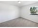 Carpeted bedroom with natural light offers a blank canvas to create a unique personal space at 9420 Ripley Rd, Thonotosassa, FL 33592