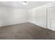 Comfortable carpeted bedroom features a spacious closet and provides ample space for personalization at 9420 Ripley Rd, Thonotosassa, FL 33592