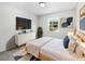 Inviting bedroom with large window, neutral tones, and modern decor for a serene retreat at 9420 Ripley Rd, Thonotosassa, FL 33592