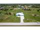 Aerial view of single-Gathering home with a large lawn at 261 Rotonda S Blvd, Rotonda West, FL 33947