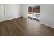 Living Room featuring modern flooring and sliding door at 8253 Penwood Dr, Port Richey, FL 34668