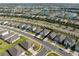 Aerial view showcasing homes with manicured lawns in a well planned neighborhood at 17737 Canopy Pl, Bradenton, FL 34211