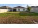 The backyard has a screened patio and a tall white vinyl fence at 17737 Canopy Pl, Bradenton, FL 34211
