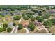 A home with long driveways and mature trees in a rural neighborhood at 2202 Sparkman Rd, Plant City, FL 33566