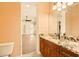 Bathroom view featuring neutral walls, tile flooring, granite counters, and vanity at 2202 Sparkman Rd, Plant City, FL 33566