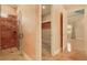 Bathroom featuring a walk-in shower and closet at 2202 Sparkman Rd, Plant City, FL 33566