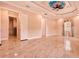 Main bedroom with large windows, tile floors, fan, and decorative ceiling at 2202 Sparkman Rd, Plant City, FL 33566