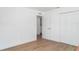 Spacious bedroom with a large closet and an open closet with shelves provides plenty of storage at 2239 Worrington St, Sarasota, FL 34231