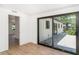 Wood flooring and sliding glass doors opening to the spacious backyard patio at 2239 Worrington St, Sarasota, FL 34231