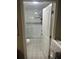 Stylish bathroom with patterned tile floor and a modern subway tile shower at 5004 E Seneca Ave, Tampa, FL 33617