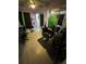 Bedroom with purple walls, mirrors, and modern black chair at 5004 E Seneca Ave, Tampa, FL 33617