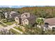 Stunning two-story home featuring beautiful landscaping and a well-maintained lawn at 11818 Gilmerton Dr, Riverview, FL 33579
