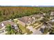 Exterior elevation showcasing a spacious home with well-manicured landscaping and a welcoming driveway at 11818 Gilmerton Dr, Riverview, FL 33579