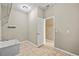 Utility room with sink, tile flooring, and lighting at 11818 Gilmerton Dr, Riverview, FL 33579