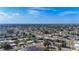 Panoramic aerial perspective of a residential community with neatly arranged homes and a network of roads at 22131 Bahama Ave, Port Charlotte, FL 33952