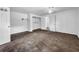 Bright bedroom with neutral carpet and an ensuite closet at 5213 Keene Dr, Plant City, FL 33566