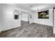 Open-concept living room featuring stylish floors and neutral paint colors at 5213 Keene Dr, Plant City, FL 33566