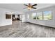Bright living room featuring stylish floors, natural light, and an open-concept design at 5213 Keene Dr, Plant City, FL 33566