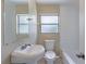 Bathroom with updated fixtures, subway tile surround and good natural light at 1409 N Garden Ave, Clearwater, FL 33755