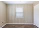 Bedroom featuring wood-look flooring, neutral walls and good natural light at 1409 N Garden Ave, Clearwater, FL 33755