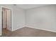 Bedroom with neutral walls, carpet, a door, and recess lighting at 541 Vista Ridge Dr, Ruskin, FL 33570