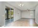 Bright dining area with sliding glass doors to the patio and stylish tile flooring throughout at 541 Vista Ridge Dr, Ruskin, FL 33570