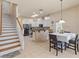 Bright, eat-in kitchen featuring white cabinets and stainless steel appliances at 2818 Mossy Timber Trl, Valrico, FL 33596