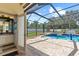 Backyard bathroom with a direct doorway to the pool and deck area at 2818 Mossy Timber Trl, Valrico, FL 33596