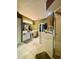 Relaxing bathroom featuring dual vanities, a glass-enclosed shower, and a soothing color scheme at 30442 Lettingwell Cir, Wesley Chapel, FL 33543