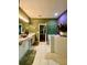 Bathroom showcasing dual sinks, a soaking tub, and a separate glass-enclosed shower at 30442 Lettingwell Cir, Wesley Chapel, FL 33543