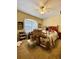 Bedroom with boxes, bed, dresser, and window at 30442 Lettingwell Cir, Wesley Chapel, FL 33543