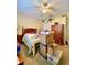 Bedroom featuring a bed, closet and stacked cardboard boxes at 30442 Lettingwell Cir, Wesley Chapel, FL 33543