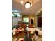 View of the dining room with doorway to hall and living room in a home under renovation at 30442 Lettingwell Cir, Wesley Chapel, FL 33543