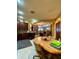 View of the eat-in kitchen with stainless steel appliances and open access to other rooms at 30442 Lettingwell Cir, Wesley Chapel, FL 33543