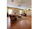 Spacious living room featuring hardwood floors, neutral colors, and modern decor at 30442 Lettingwell Cir, Wesley Chapel, FL 33543