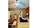 Spacious bedroom with ceiling fan, ensuite bathroom, and walk-in closet offers comfortable living at 30442 Lettingwell Cir, Wesley Chapel, FL 33543