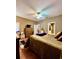 Cozy bedroom with ceiling fan and hardwood floors offers a relaxing retreat at 30442 Lettingwell Cir, Wesley Chapel, FL 33543